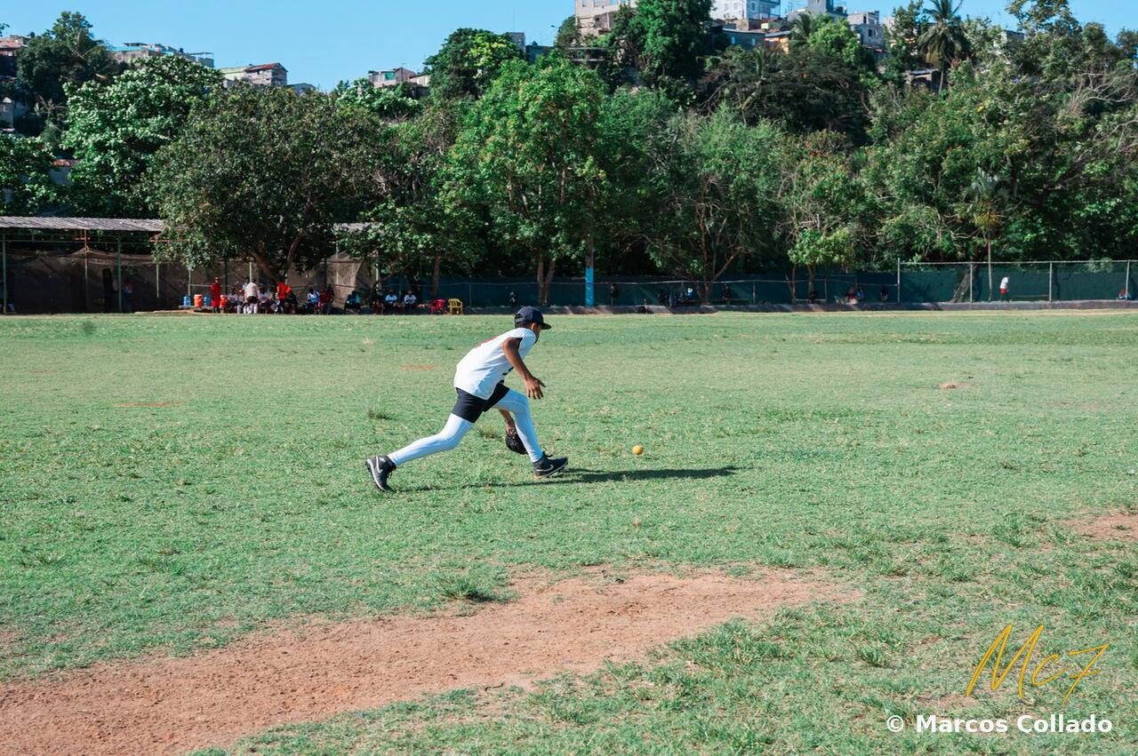 Marcos Collado fielding a ground ball during training in Santo Domingo